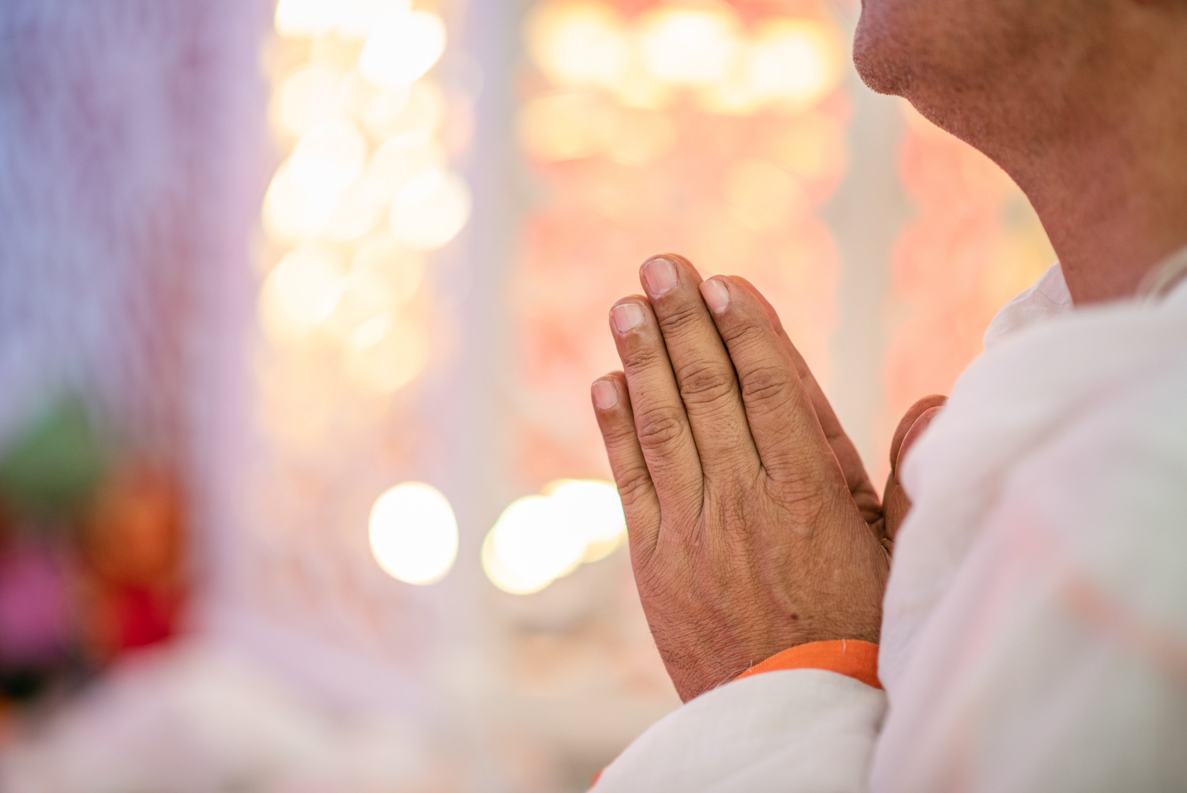 Man Praying in Temple